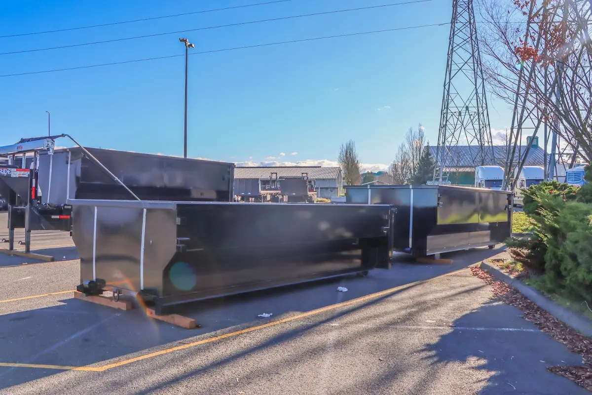 Roll-off dumpster ready for waste disposal at job site for 2 Yard Dumpster Rental in Spring Grove